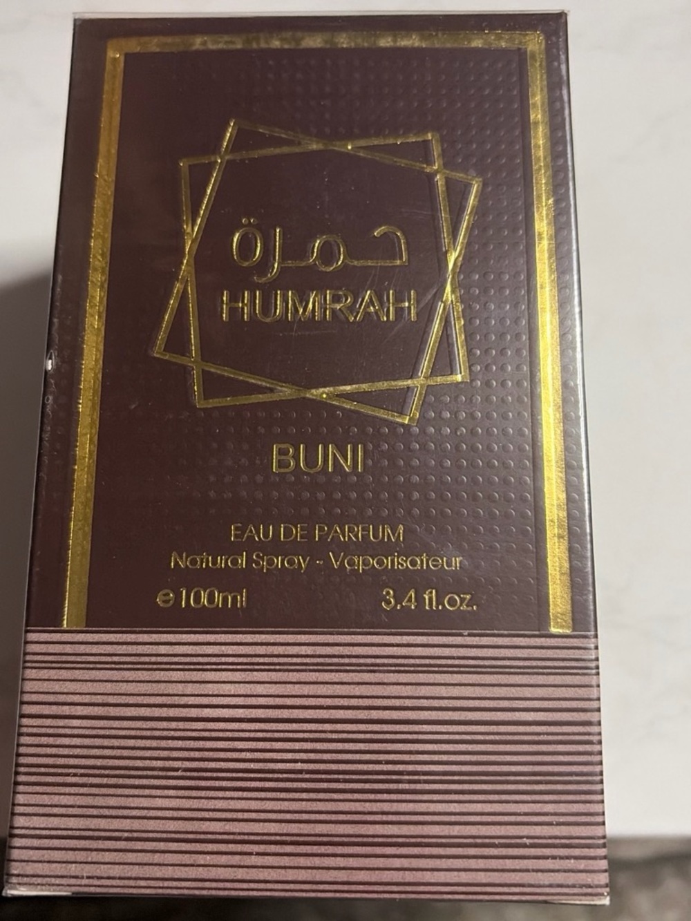 & Other Stories Brown and Gold Boxed Fragrance Packaging